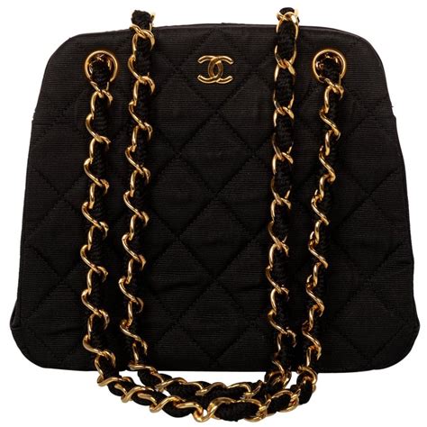 chanel quilted handbag gold chain|Chanel adjustable chain bag.